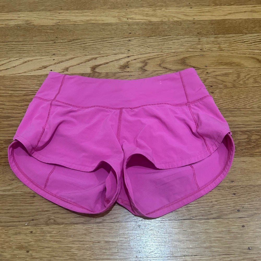 Sonic pink Lululemon low rise 2.5 inch speed ups, size 0